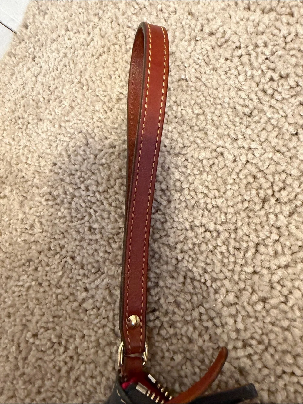 Dooney & Bourke Navy Ostrich-Texture Leather Wristlet with Brown Strap